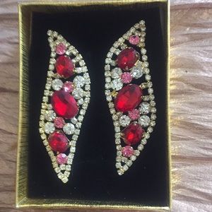 Earrings, pierced. comes in box and are brand new.